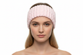 Pink knitted headband on model