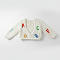 Chunky Knit Alphabet Jumper flat lay