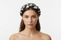 Black and white braided headband on model - front