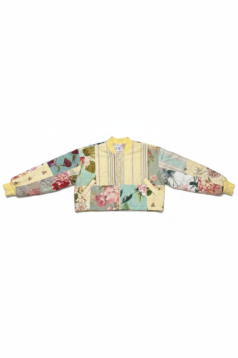 Patchwork floral cropped bomber jacket flat lay on white background