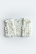 Chunky knit cream white sweater flat lay on white background