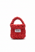 Red chunky braided knit bag with label on white background