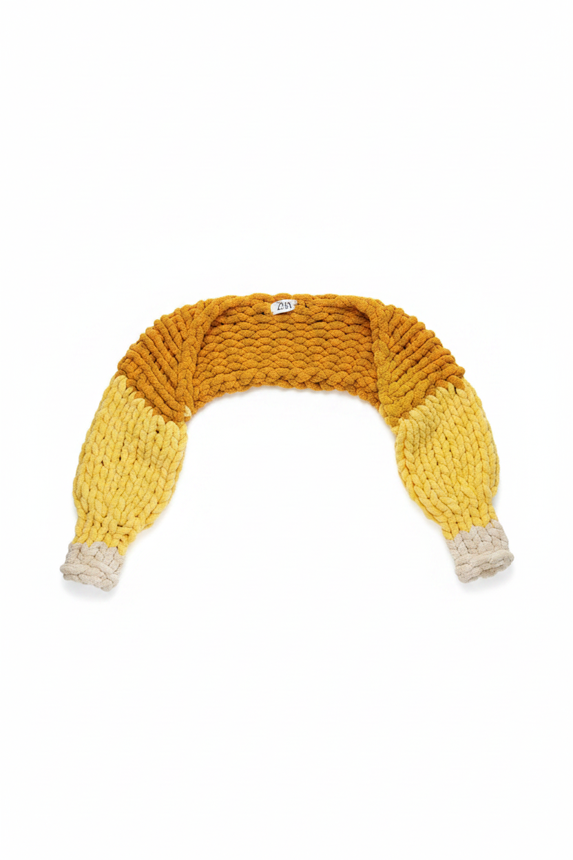 Chunky knit ombre yellow to cream sweater flat lay on white background