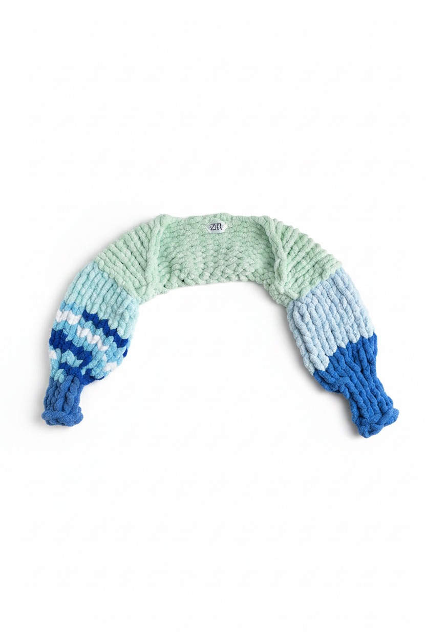 Chunky knit blue ombre sweater flat lay on white background