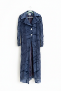 Navy crinkle iridescent maxi coat on hanger on white background